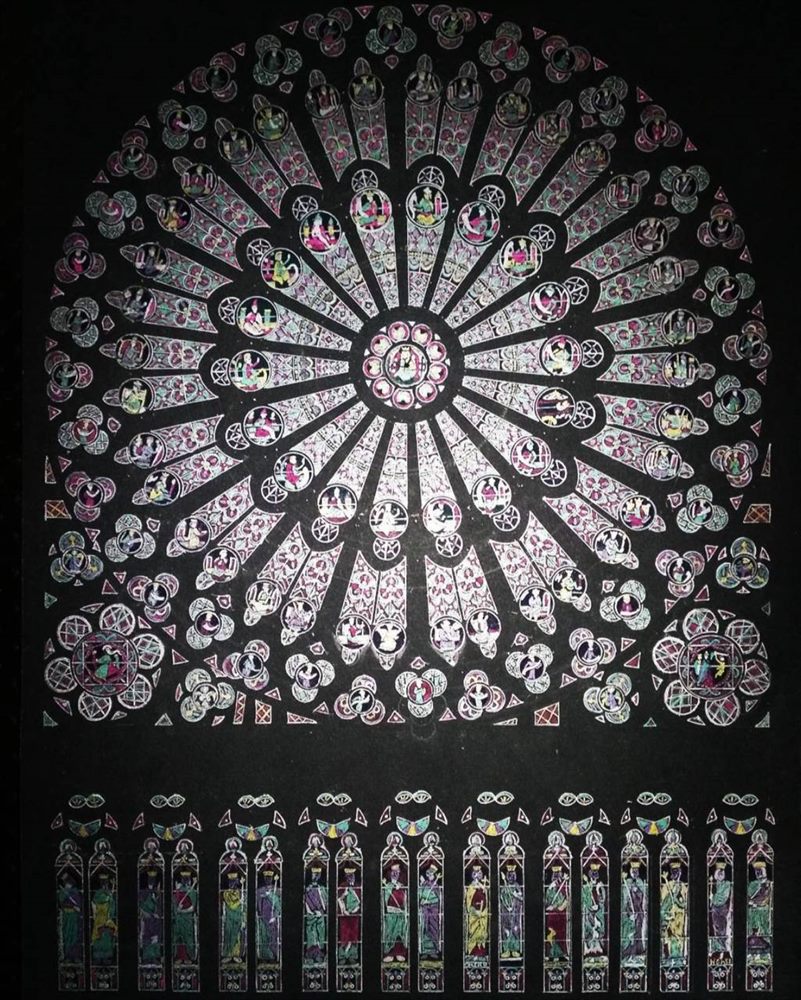 Full reproduction of the Notre-Dame rose window, drawn in marker on black canvas